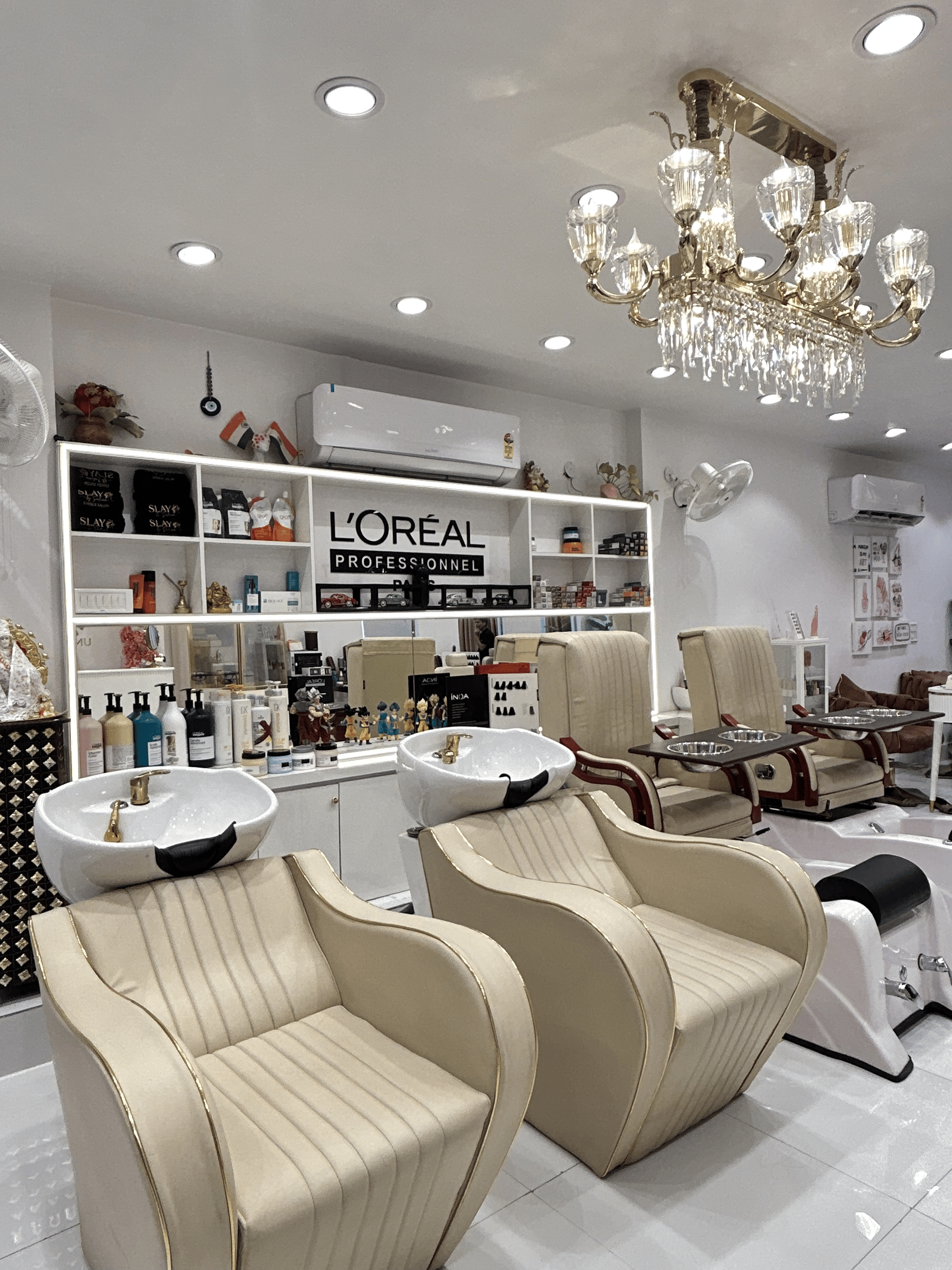 A client relaxing during a pampering hair treatment at Slay By Salina